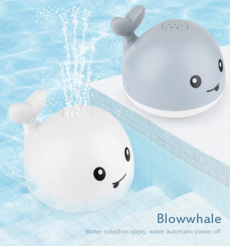 KOMAMY SPRINKLER WHALE BATH TOY WITH LED LIGHTS